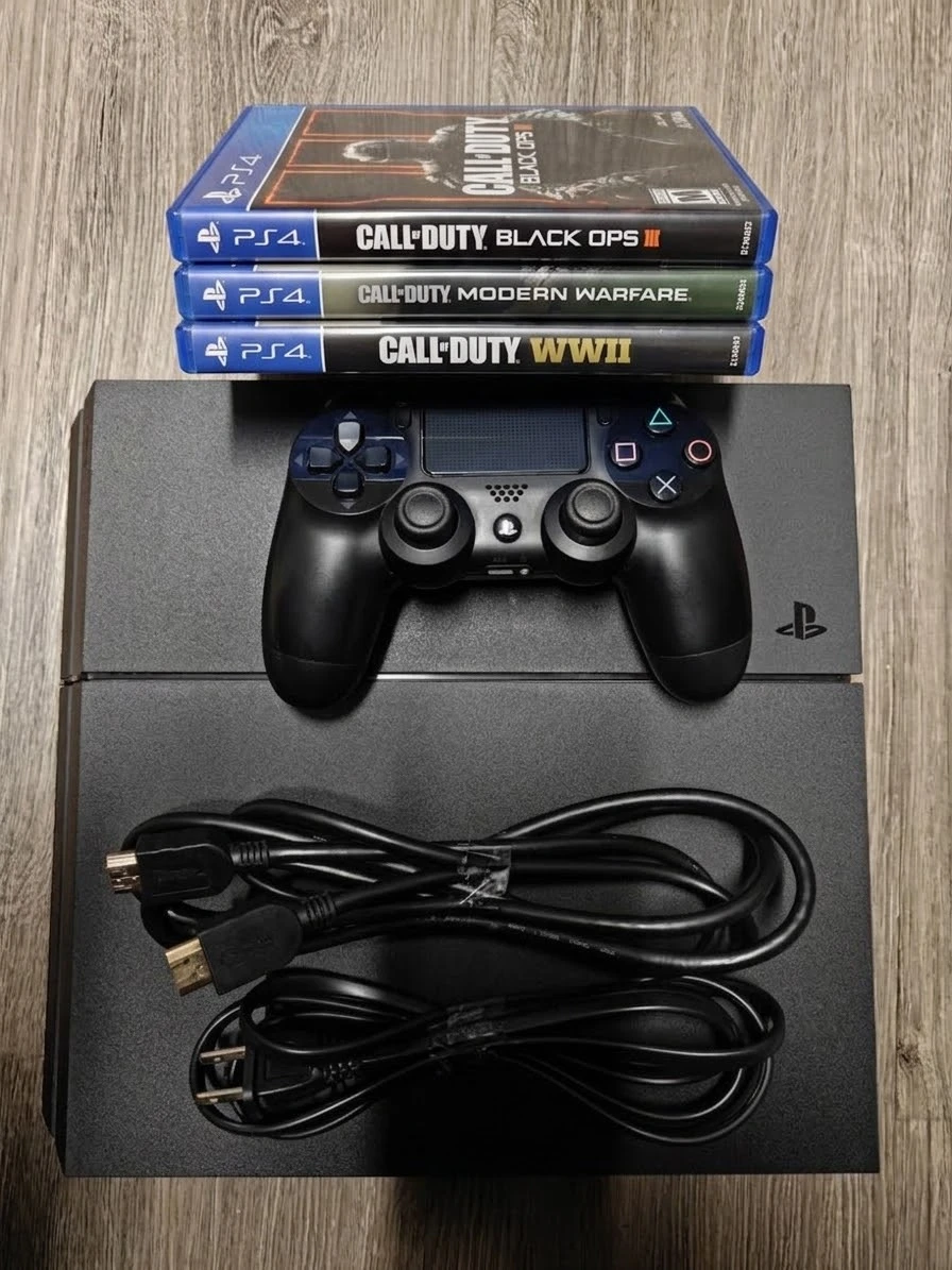 PS4 w/ 1 Controller, 3 Call of Duty Games and all the wires.