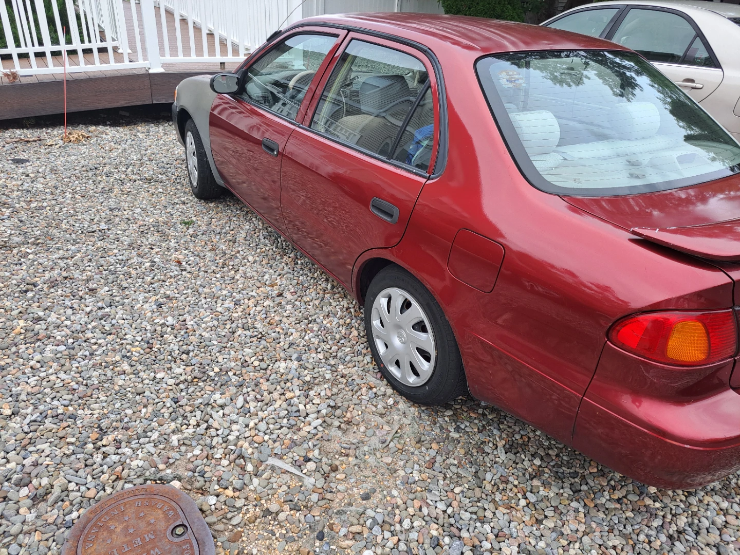 Red Toyota Corolla CE Sedan