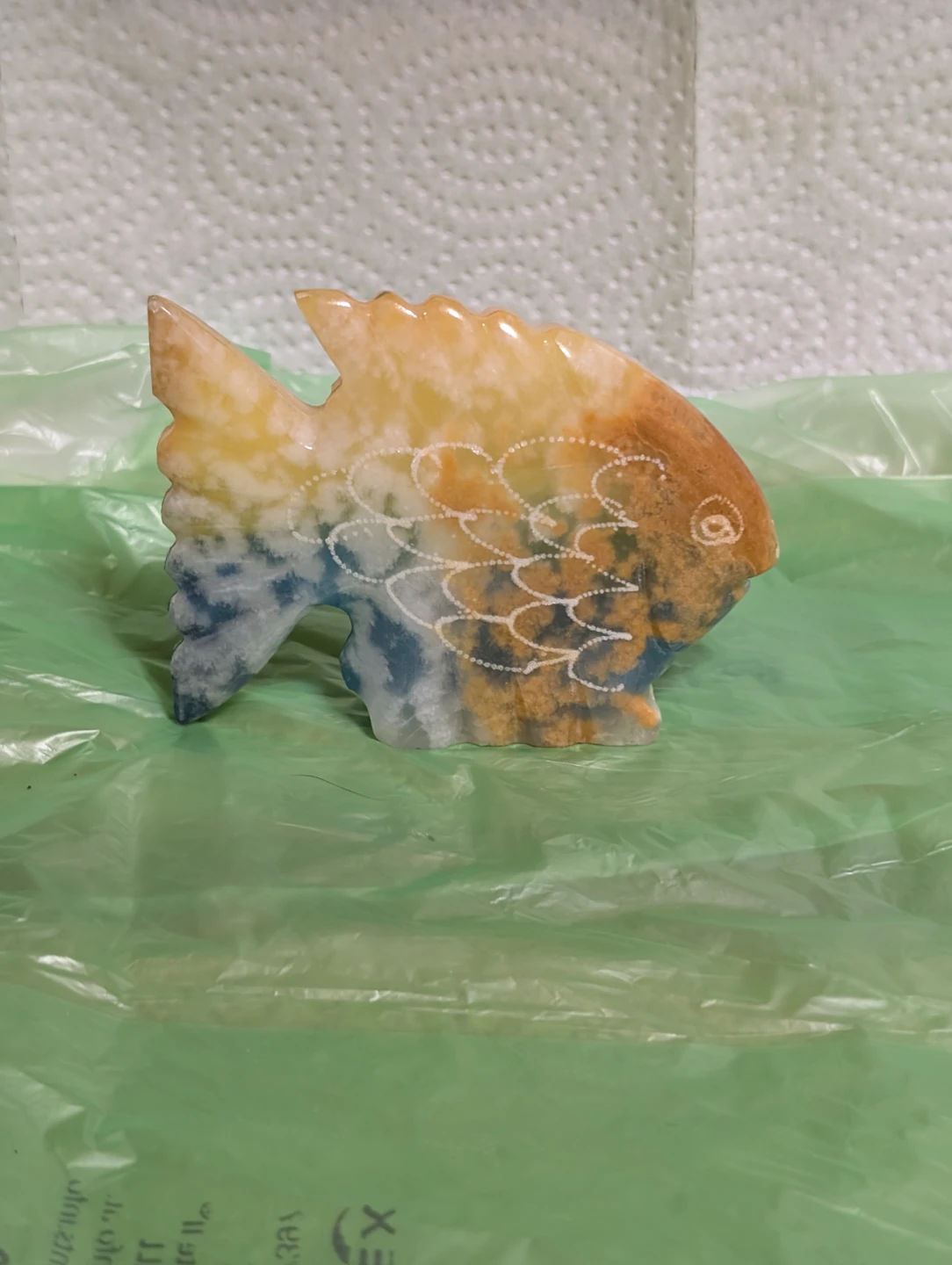 Hand-carved marble fish ornament