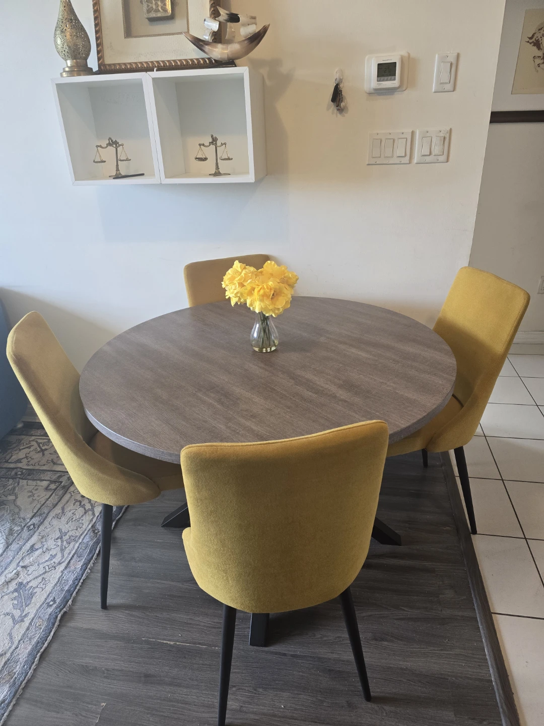 Round dining table and 4 yellow chairs