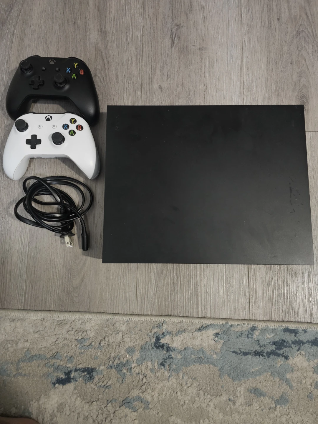 Xbox One X Console with Two Controllers