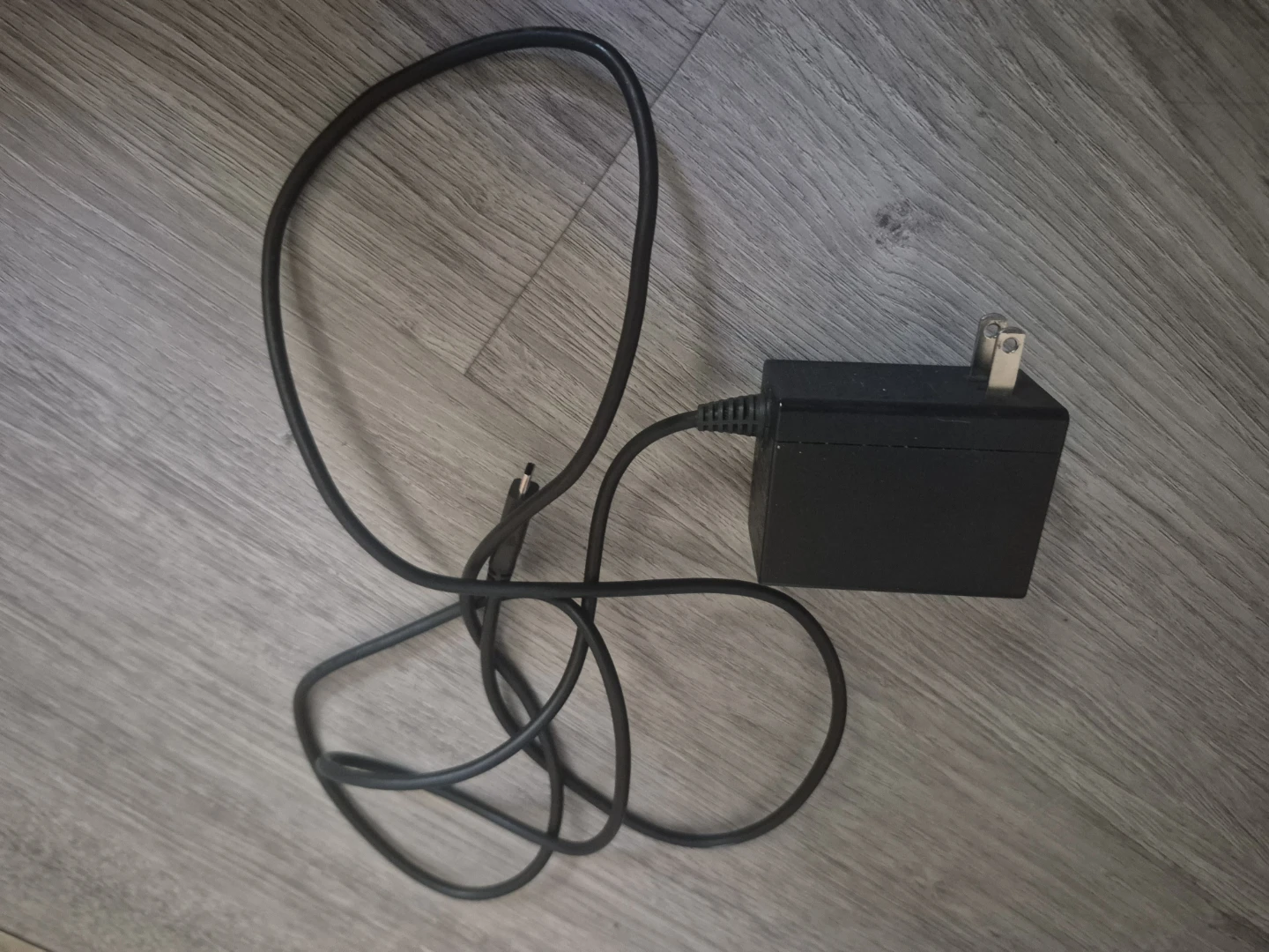 Black USB-C power adapter for Nintendo switch