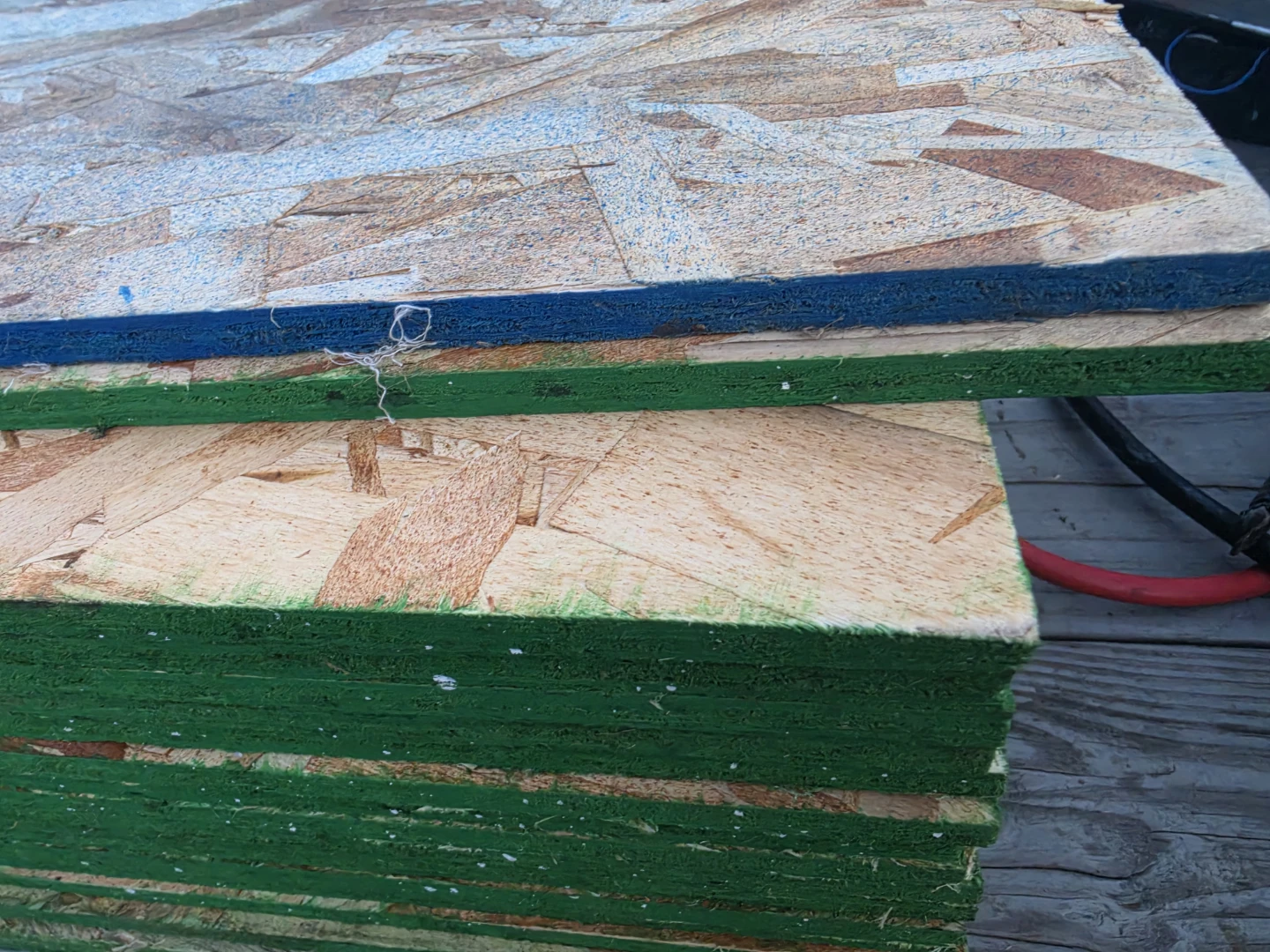 3/8 Oriented Strand Board (OSB) Sheets treated. - photo 2