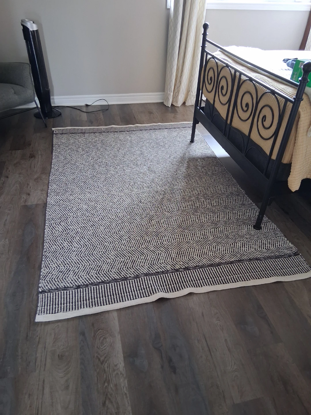 Black and white herringbone area rug