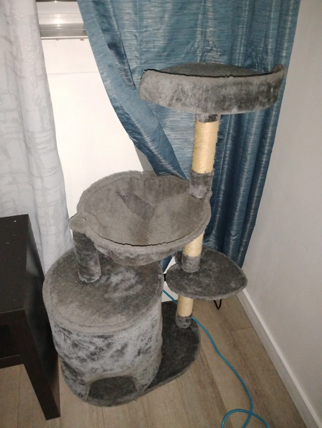 Grey multi-level cat tree with cubby