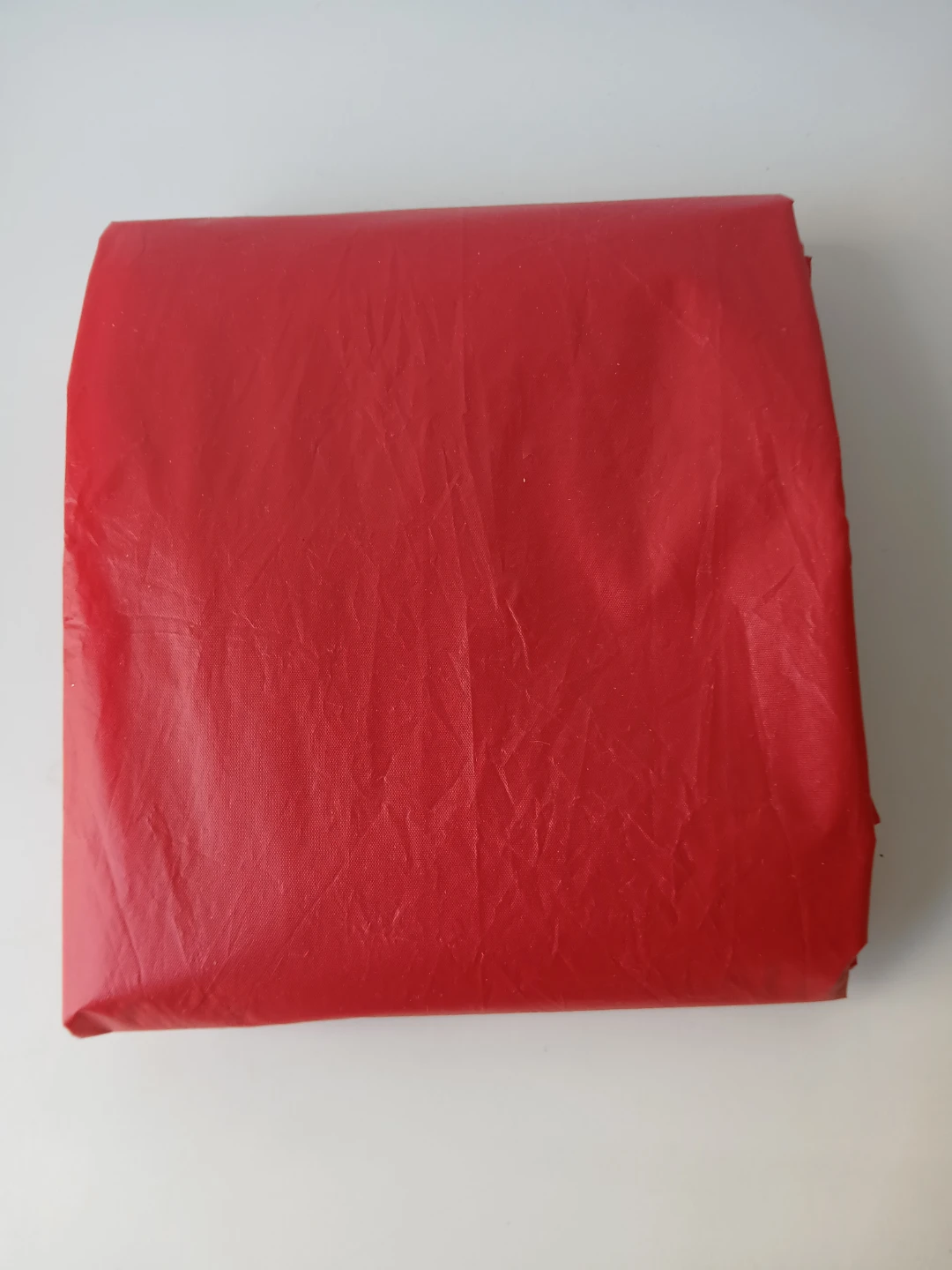 Red plastic emergency raincoat. - photo 2
