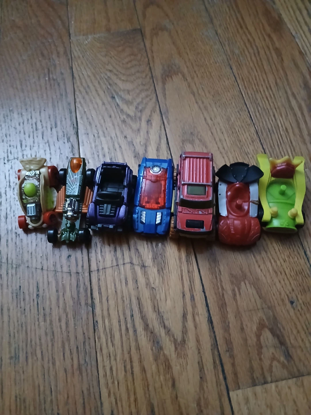 A few toy cars Not in the best condition so yeah