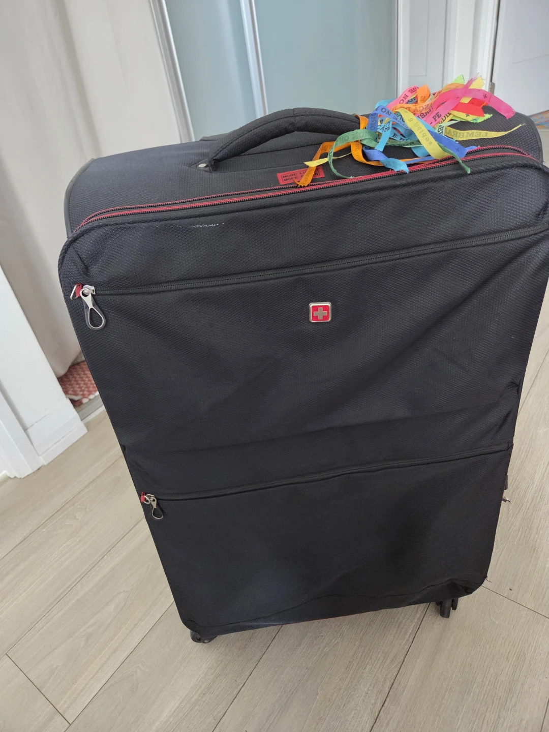SwissGear Black Wheeled Suitcase it's moving sale