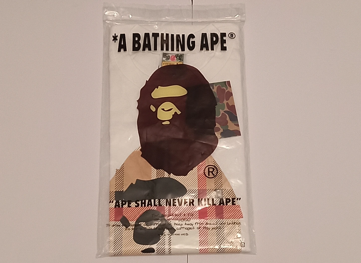 A Bathing Ape White T-Shirt with Ape Head Graphic