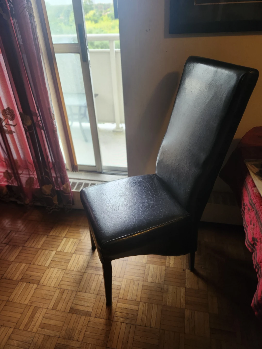 8 Black leather dining chairs