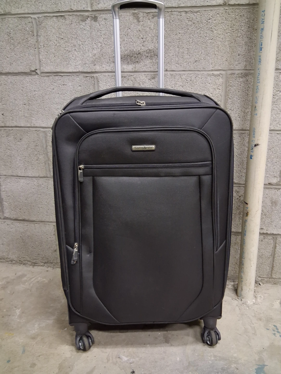Samsonite Black Rolling Suitcase