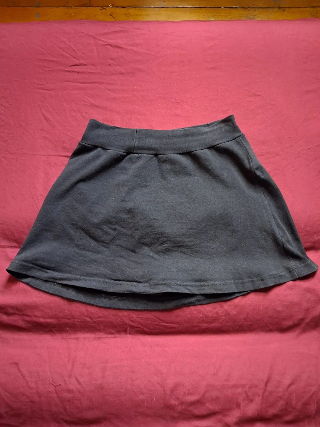 Black cotton mini skirt