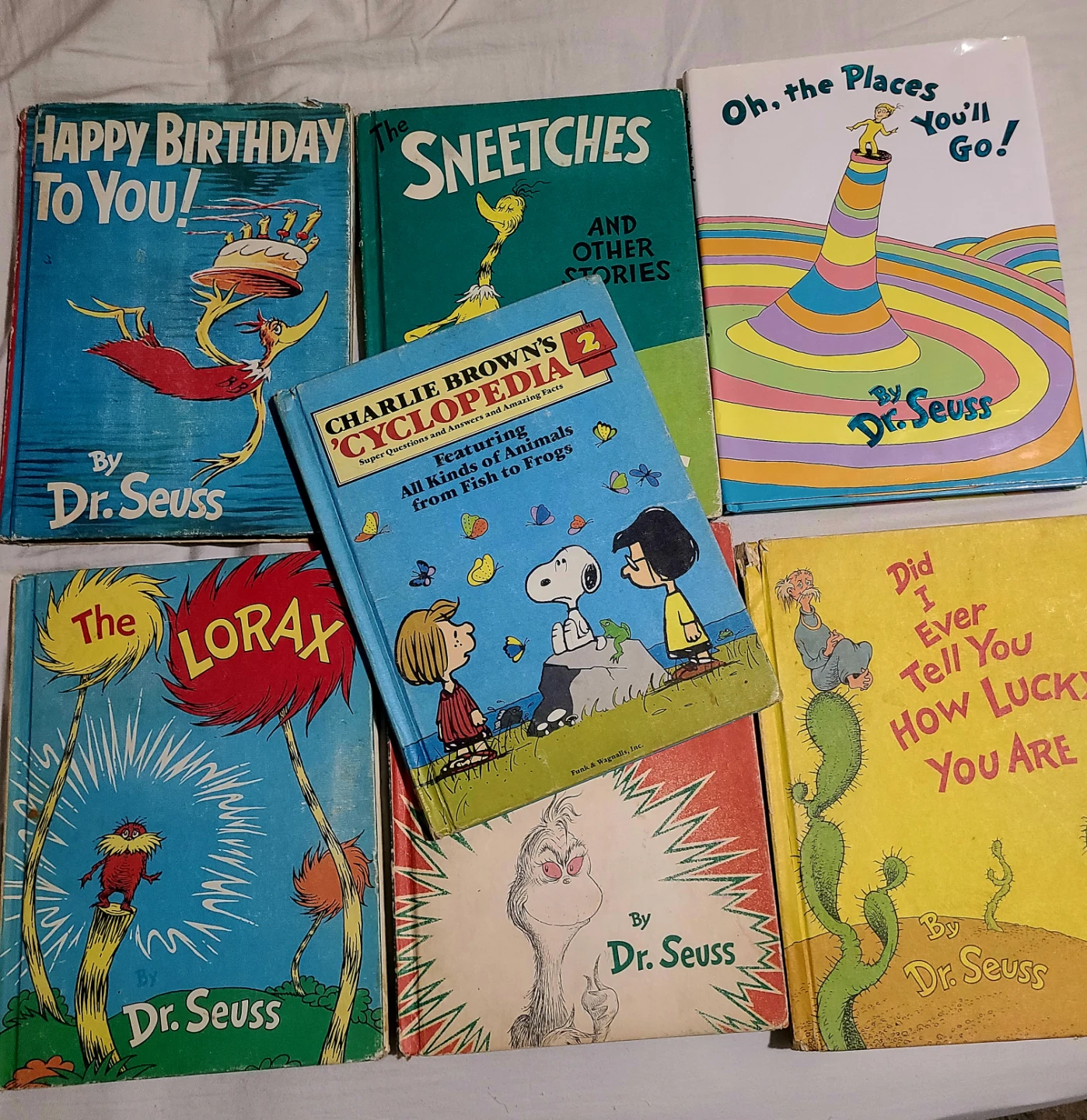7 Hardcover Dr. Seuss and Charles Schulz Books