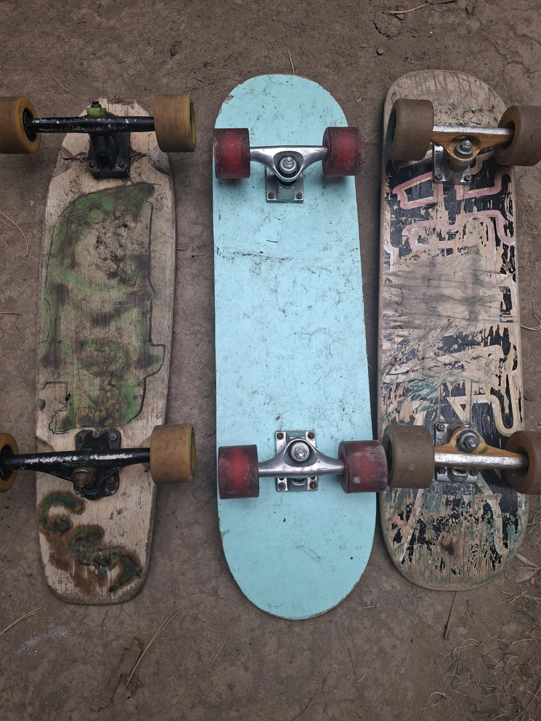 Three assorted skateboards