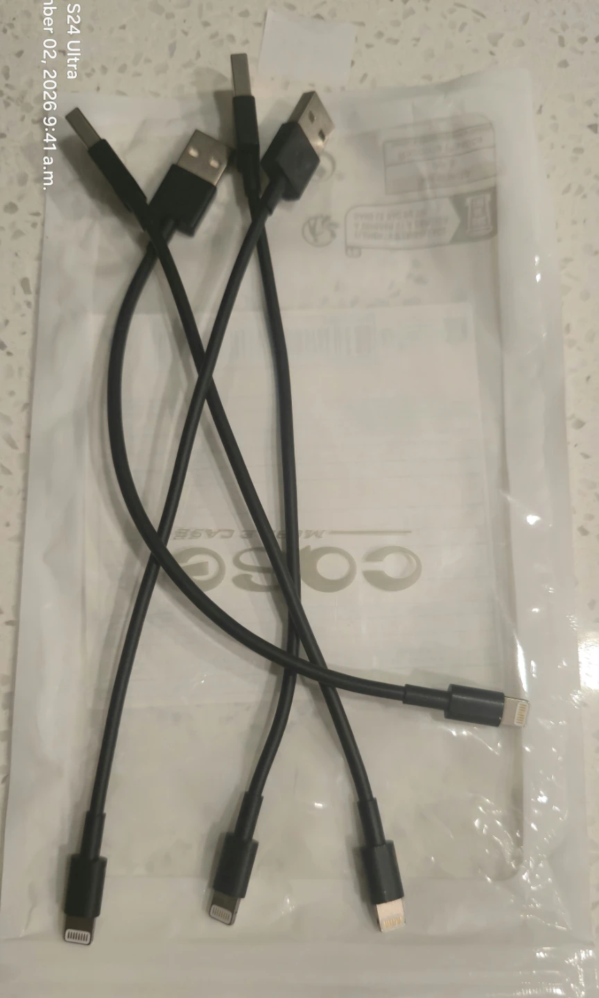 Four  black USB-A to Lightning charging cables