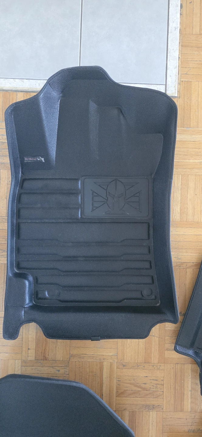 Armour Line vehicle floor mat set and steering wheel cover