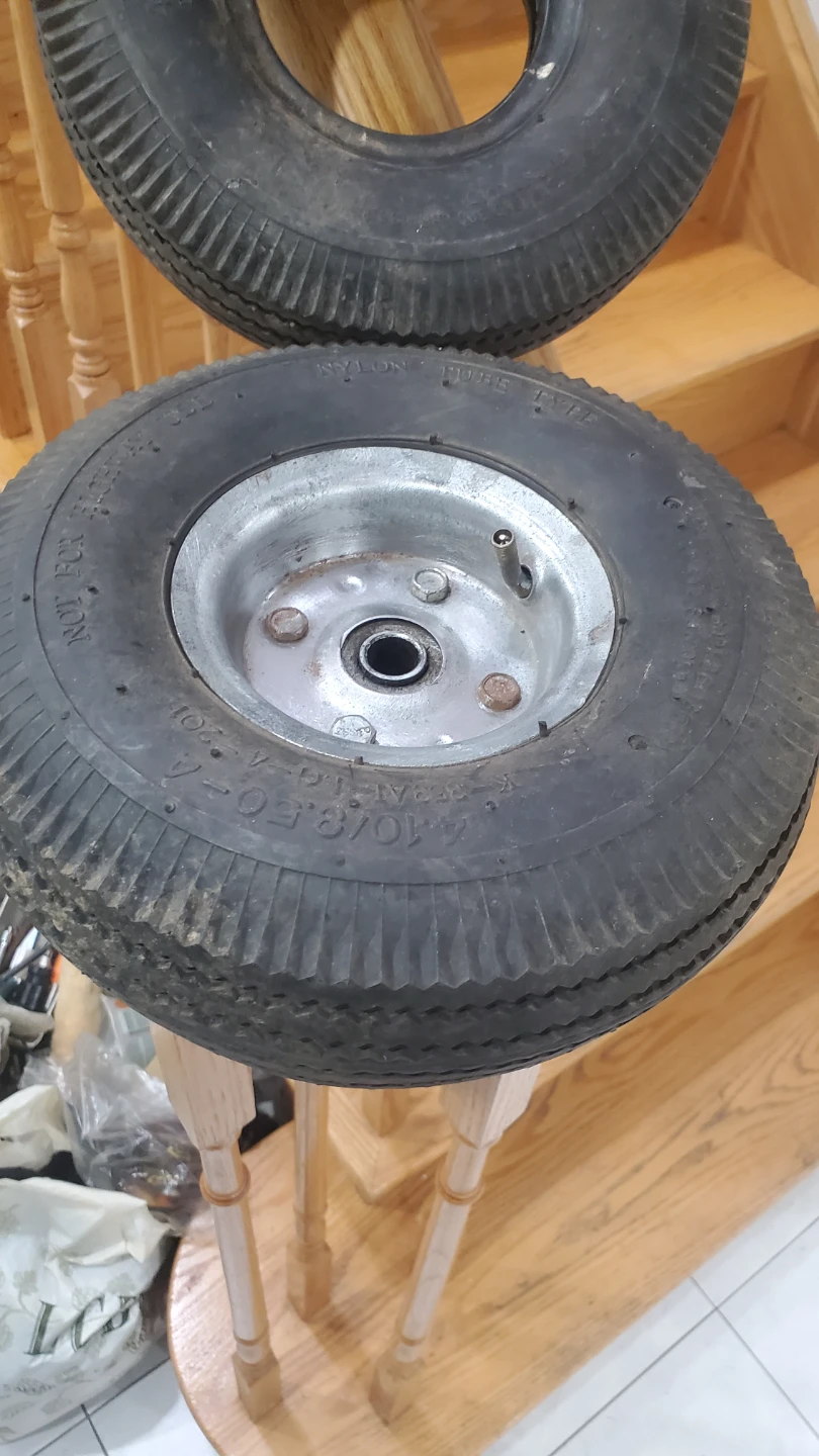 Two 4.10/3.50-4 Utility Tires with Wheels