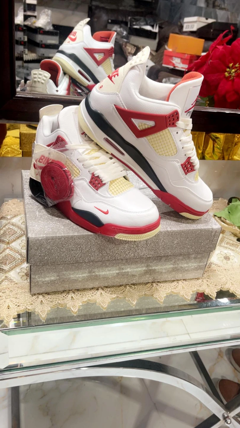 Nike Air Jordan 4 Retro Fire Red Sneakers - photo 3