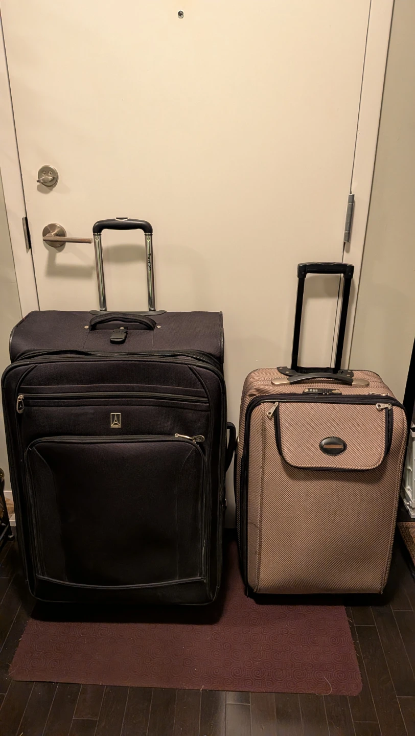 Travelpro Large Black  Spinner 32", Brown 25" Suitcase