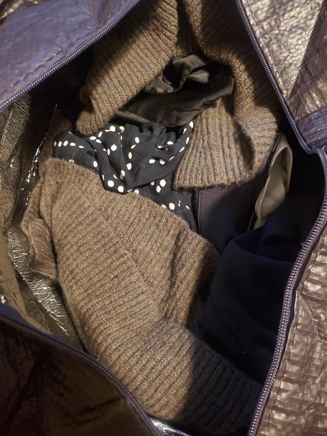 Bag of assorted woman's clothes used