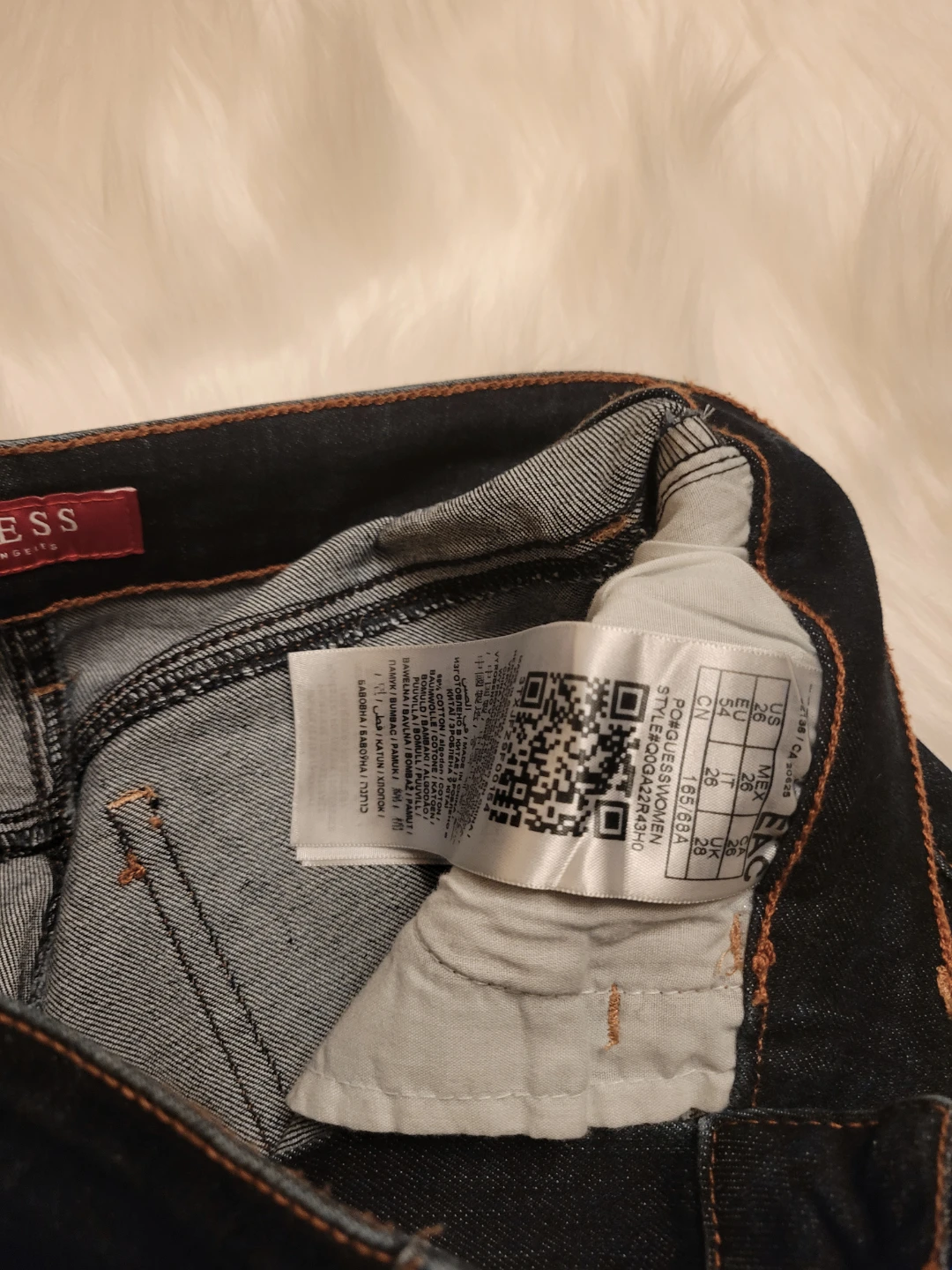 Two pairs of distressed blue jeans - photo 2