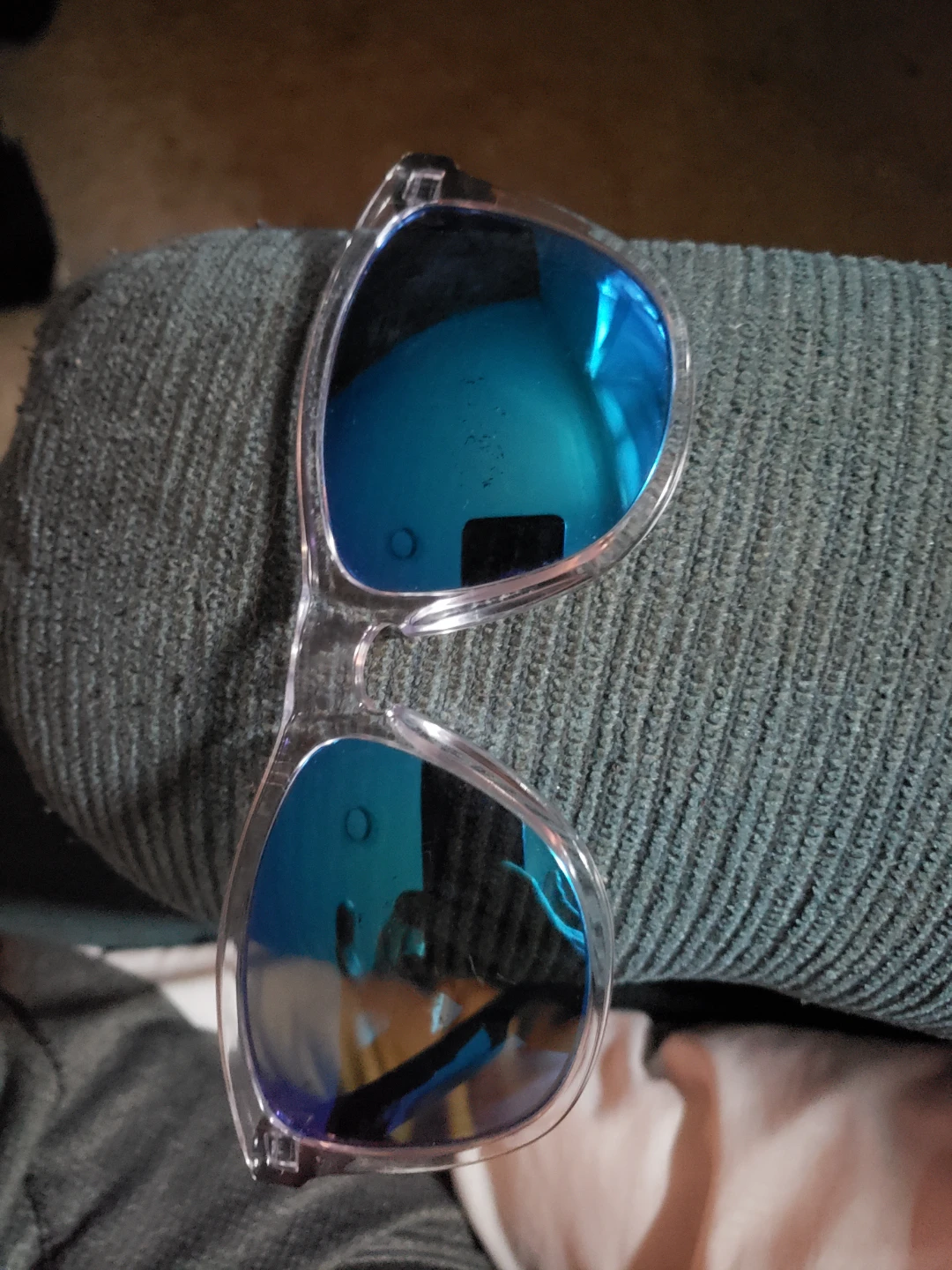 Oakley Sunglasses with Clear Frames and Blue Lenses