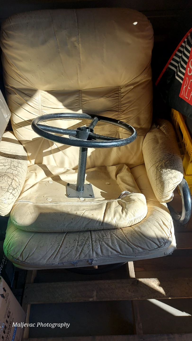 Cream leather armchair  with foot rest