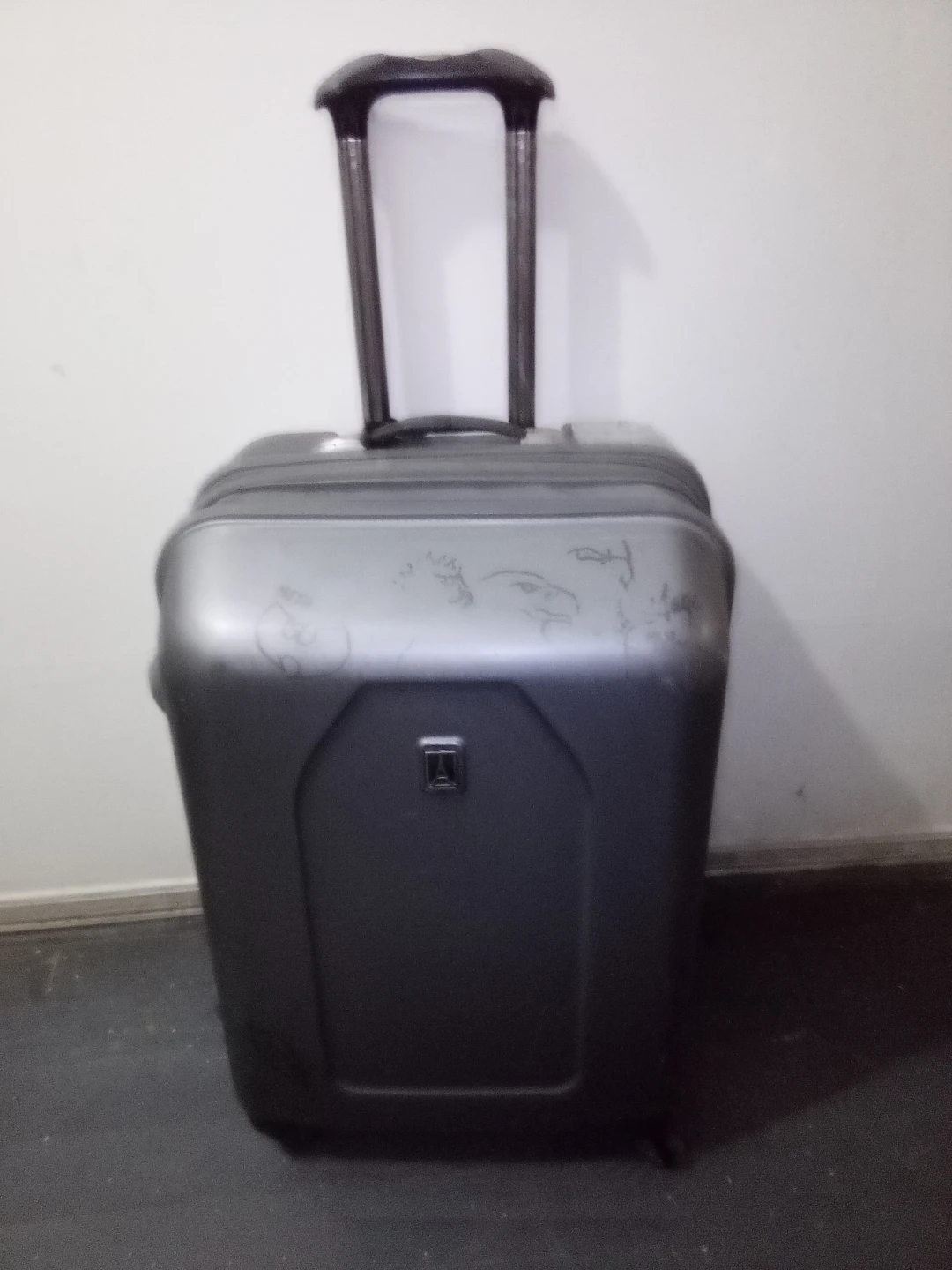 Suitcase filled with large size clothes