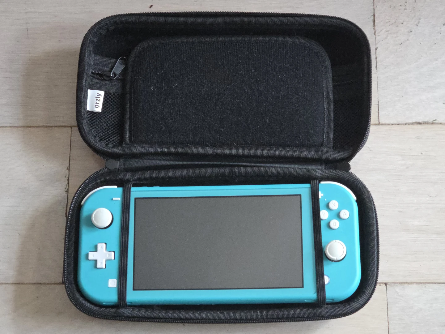 Nintendo Switch lite Coral Blue + 3 games