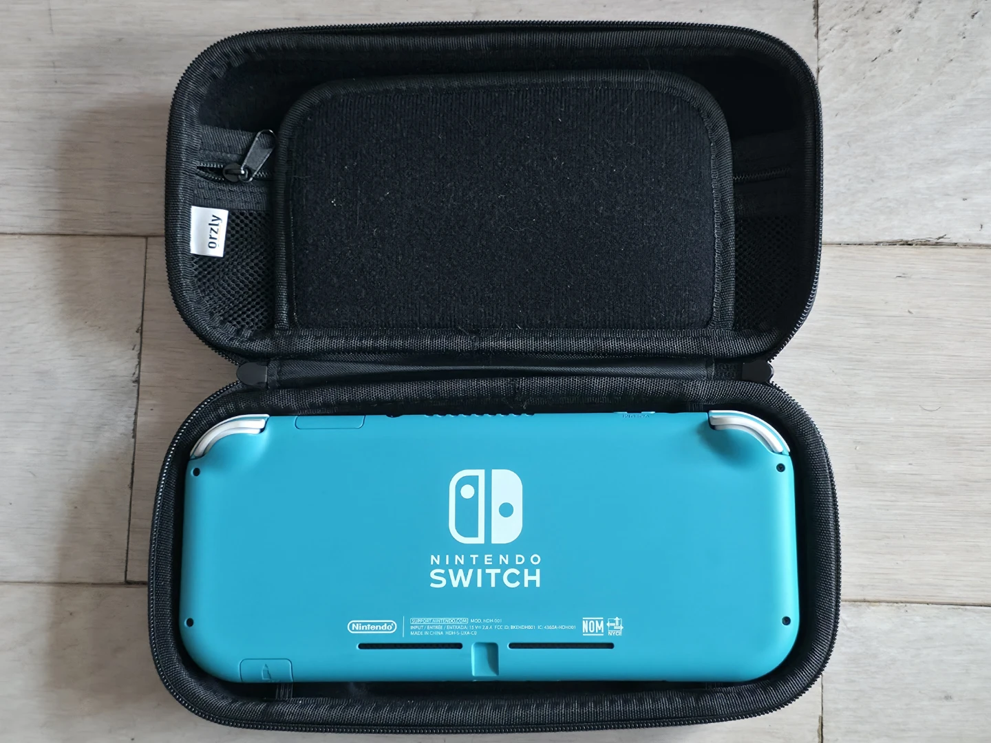 Nintendo Switch lite Coral Blue + 3 games - photo 2