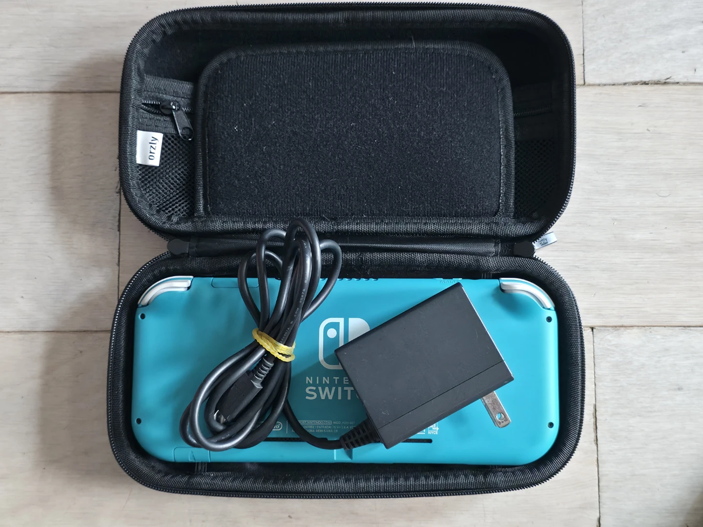 Nintendo Switch lite Coral Blue + 3 games - photo 4