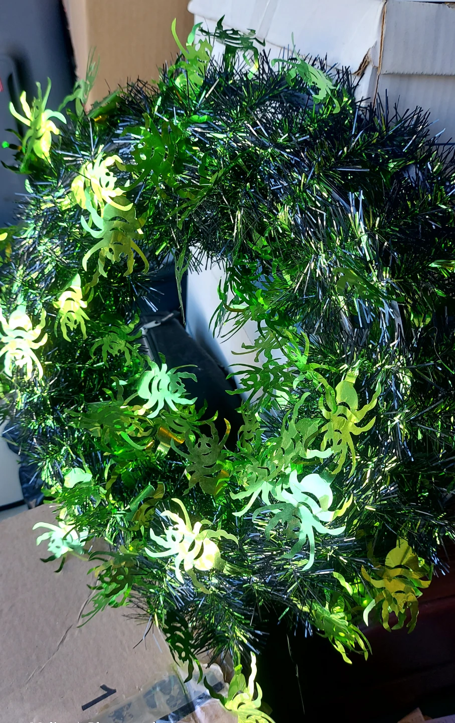 Green and black spider tinsel Halloween wreath