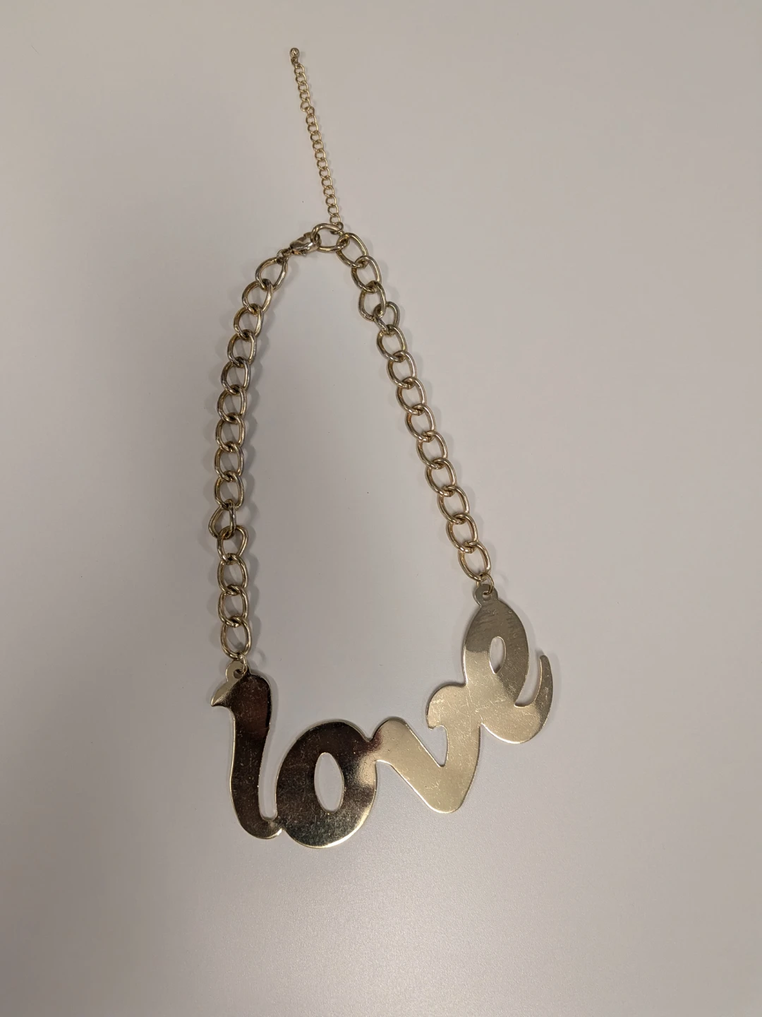 Gold-tone Love pendant necklace