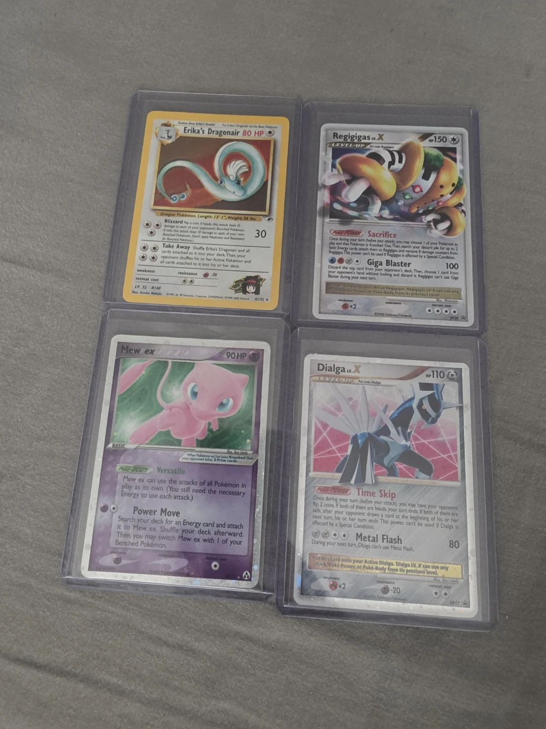 Set of 4 Rare Holo Pokemon Cards in Sleeves