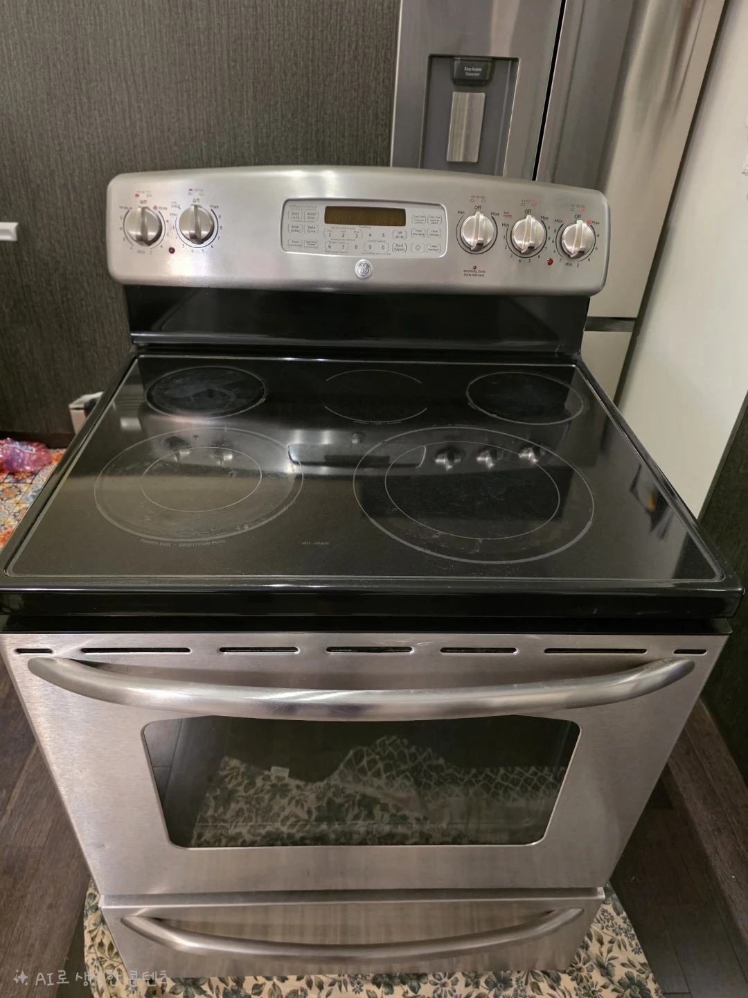GE 30” Stainless Steel Electric Range - photo 2