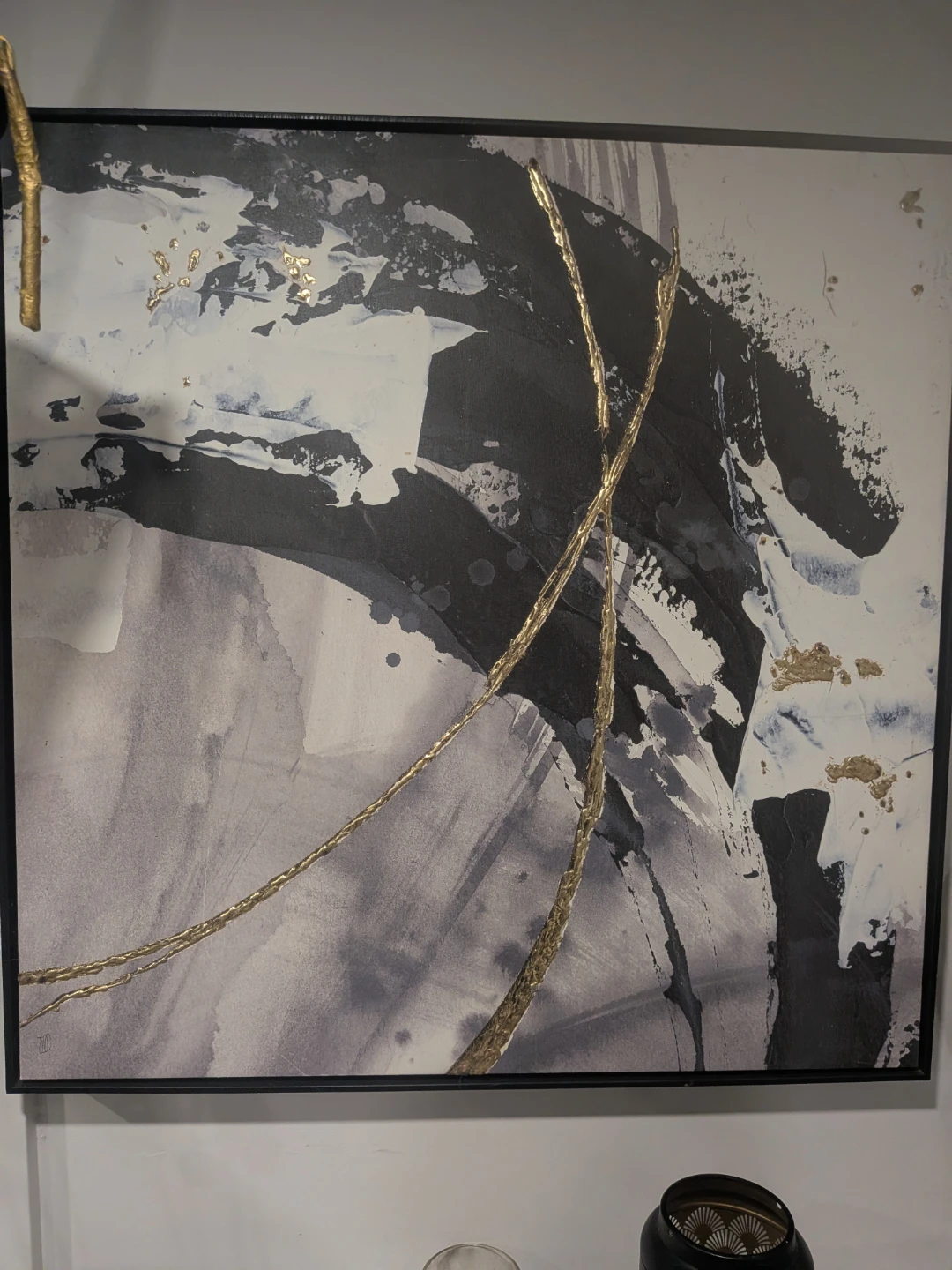 Abstract wall art with gold accents