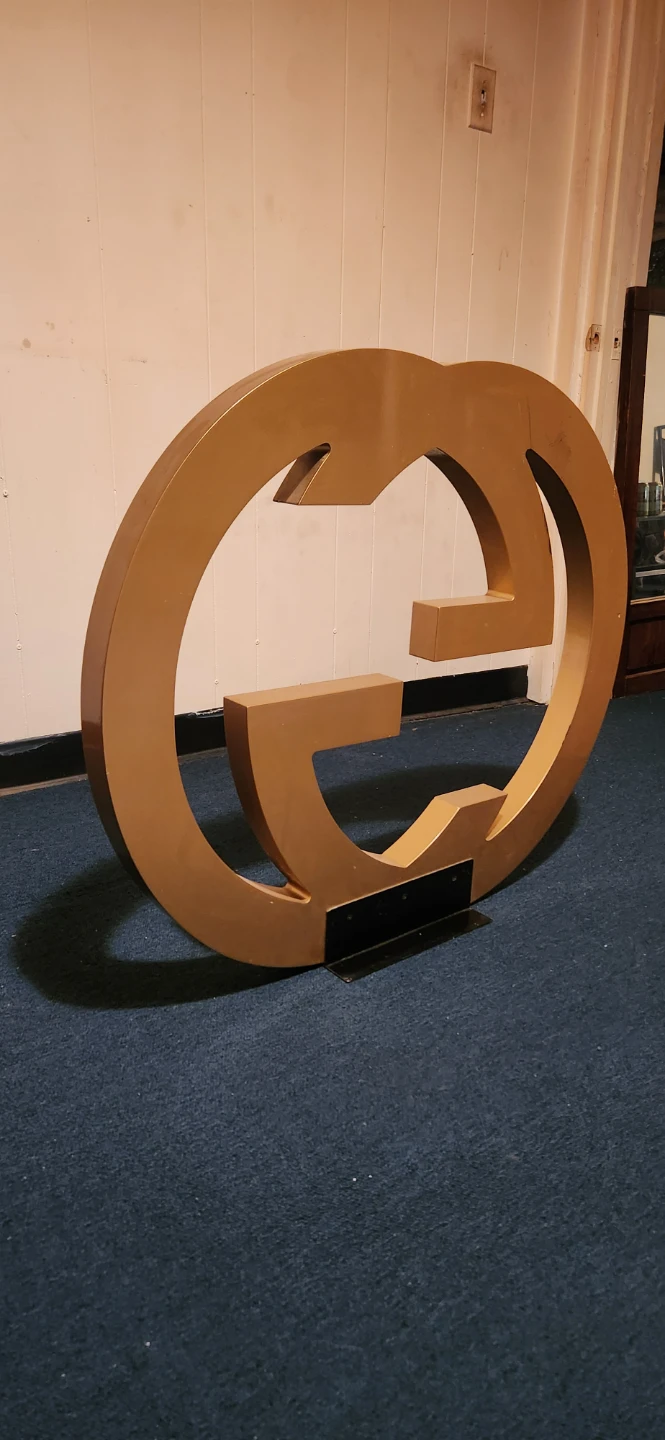 Gucci Gold Logo Display Sign