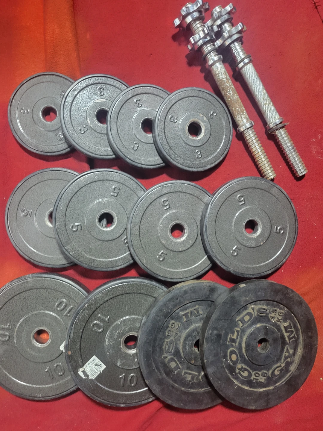 1" HOLE  72LBs WITH DUMBBELL HANDLES.  4-10s  4-5s 4-3s