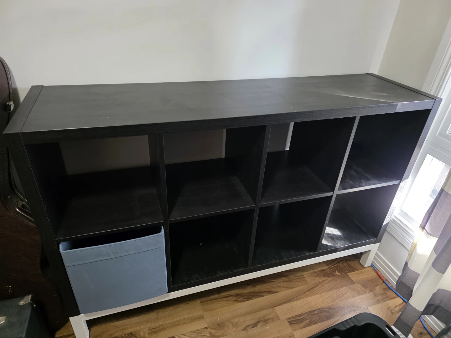 Large shelving unit with white legs
