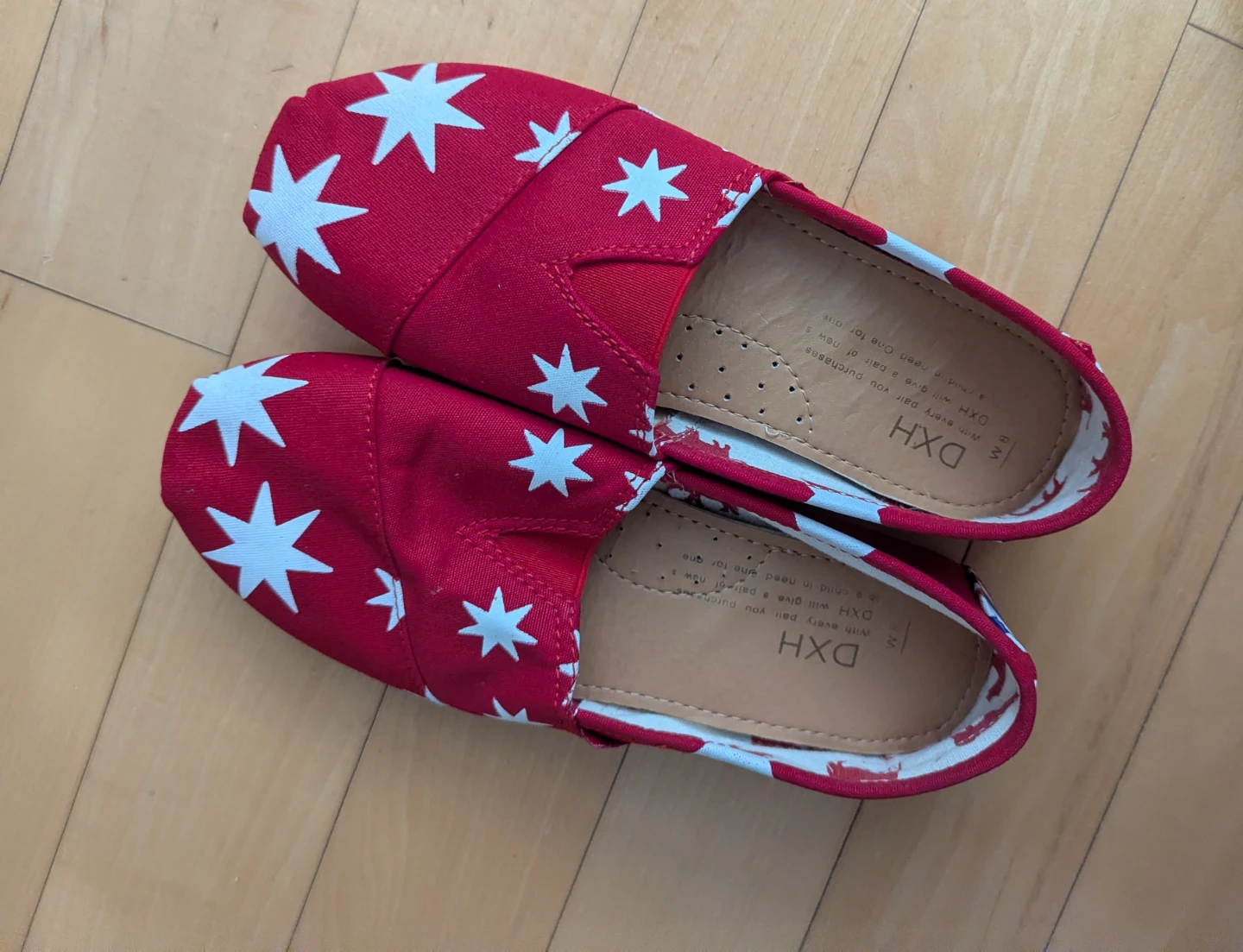 Red slip-on shoes with stars and Union Jack