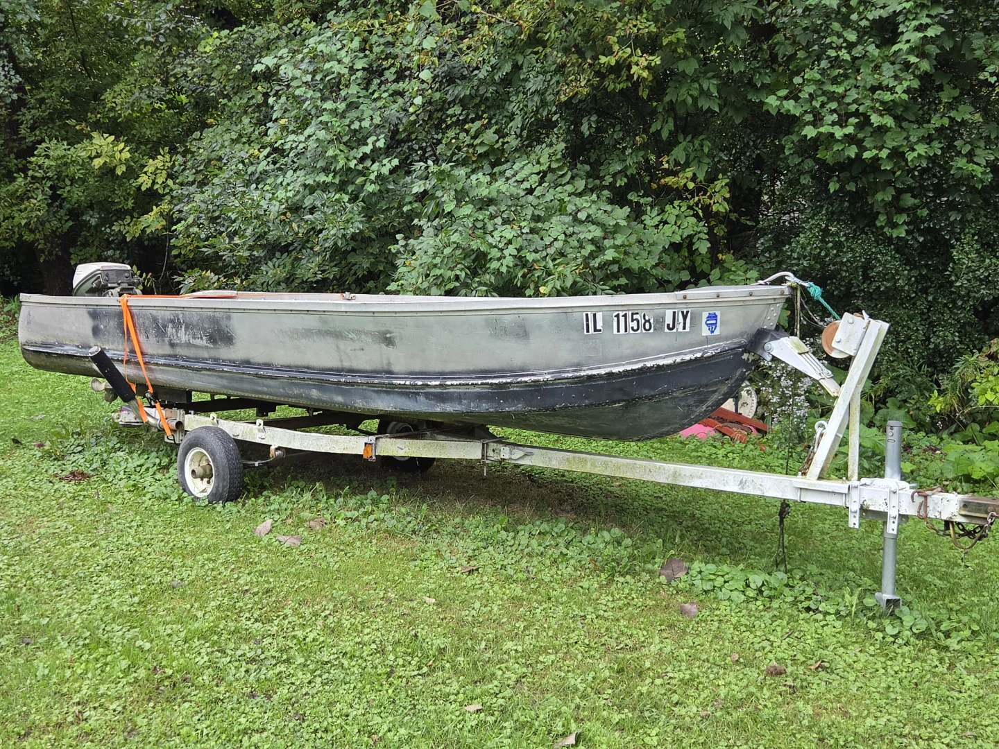 Aluminum Fishing Boat with Johnson 9.5 Outboard Motor