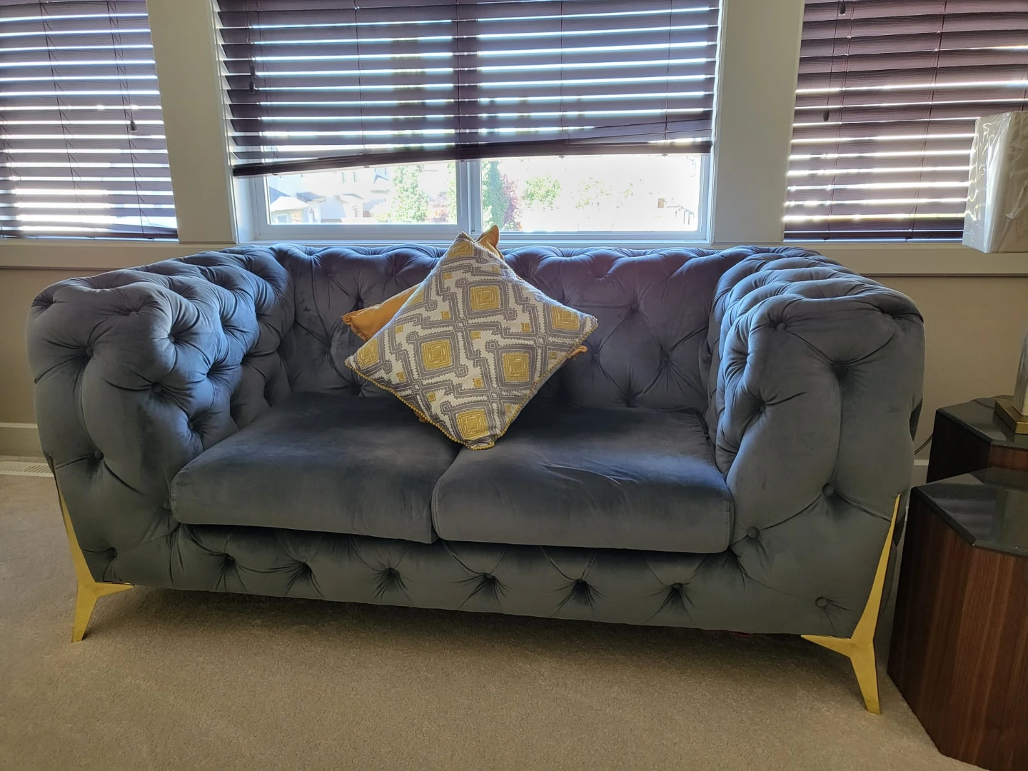 Grey velvet chesterfield sofa