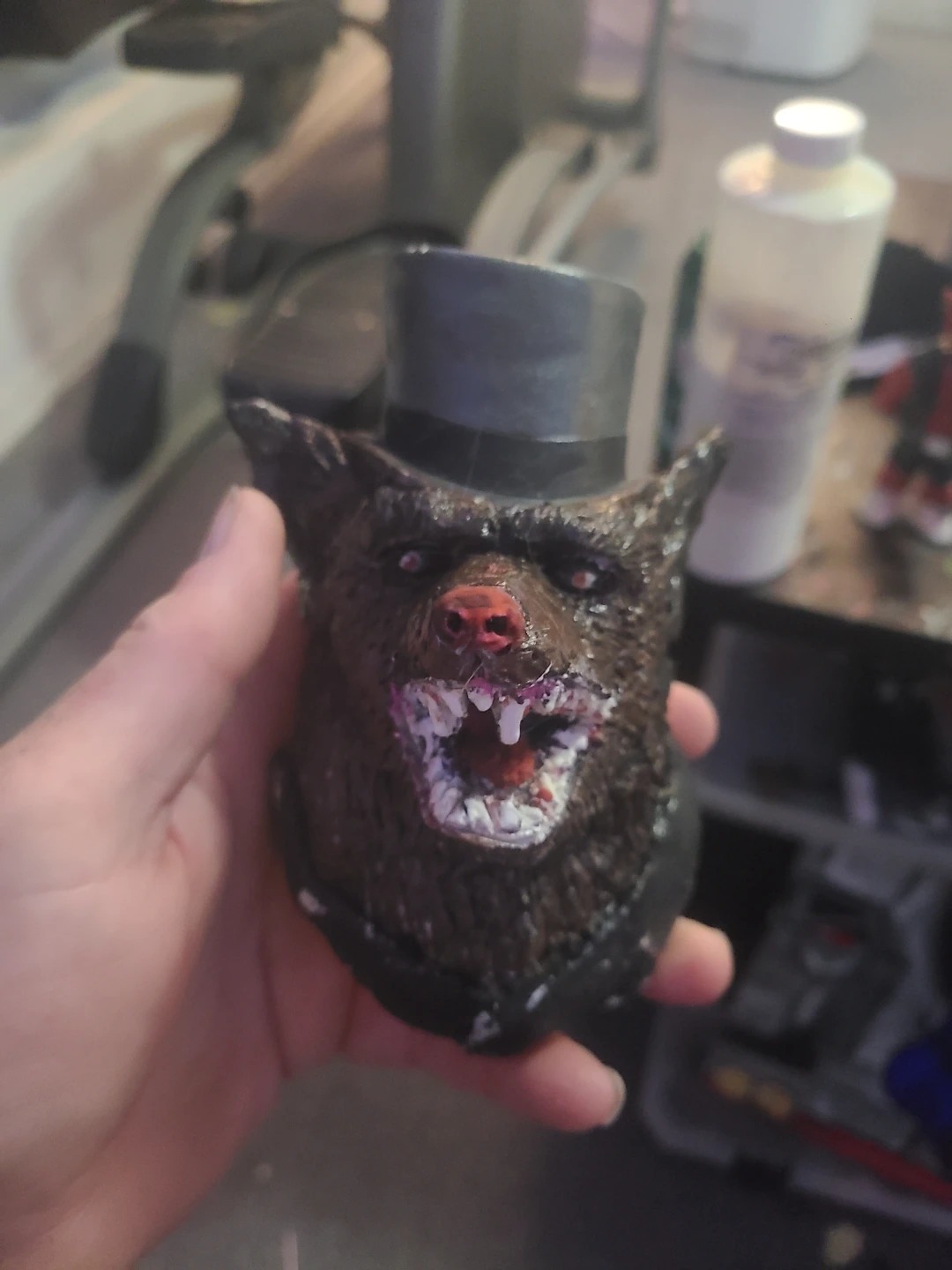 Wolf figurine wearing a top hat