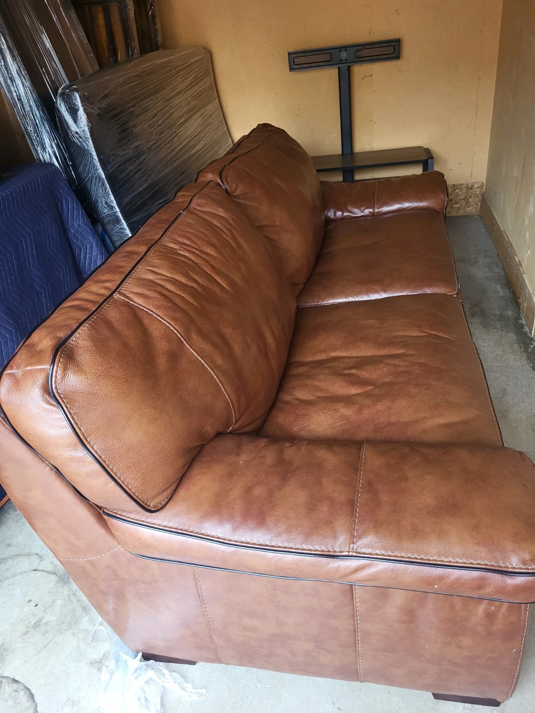 Brown Leather Three-Seater Sofa