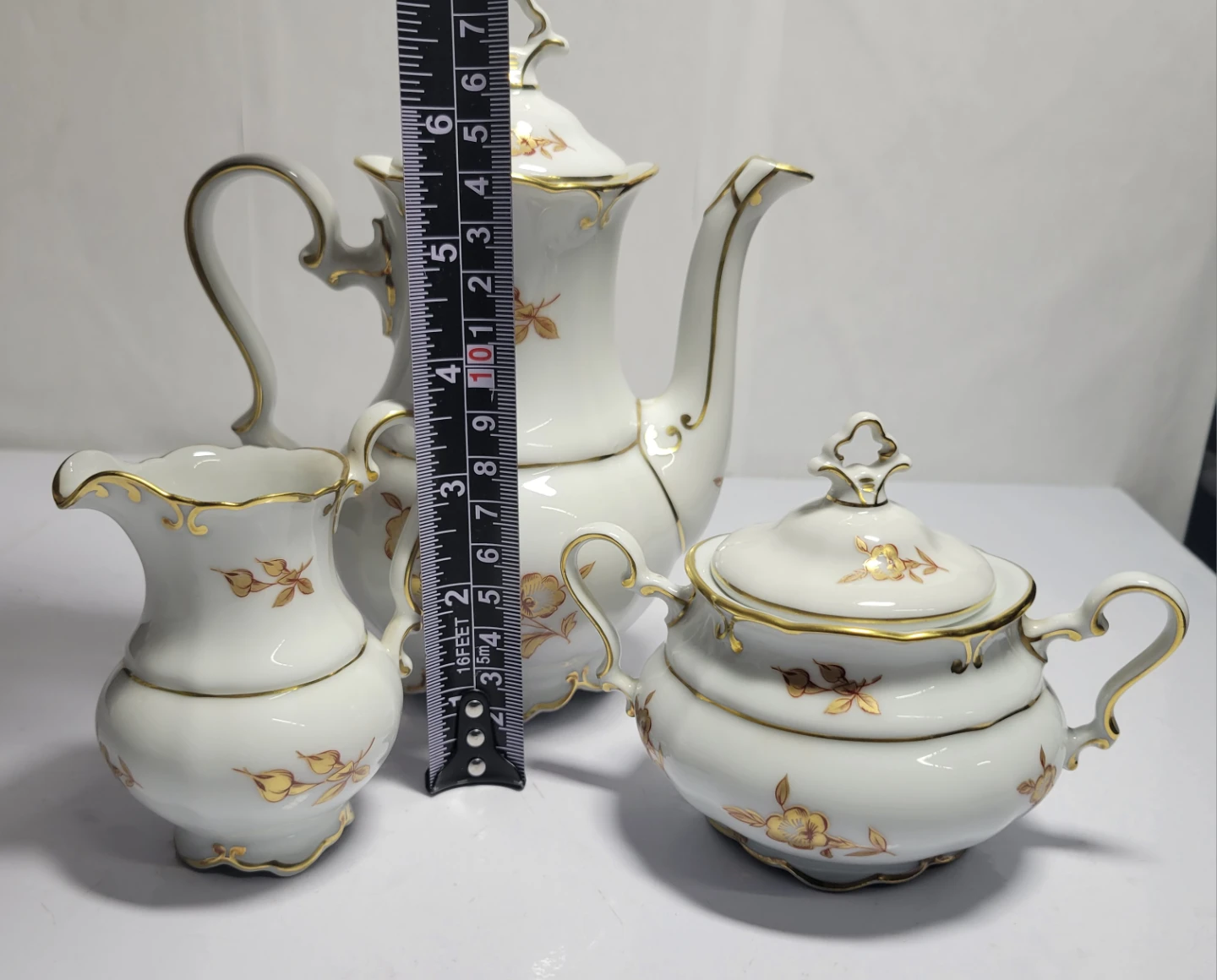 Vintage Porcelain Tea Set with Gold Trim - photo 2
