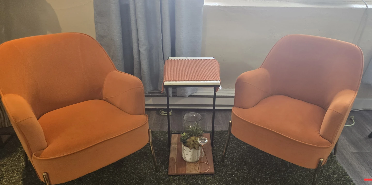Two Orange Velvet Accent Chairs