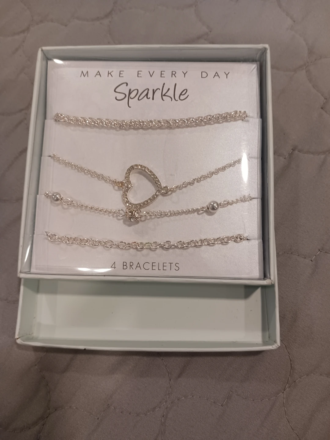 Set of 4 Silver Tone Bracelets