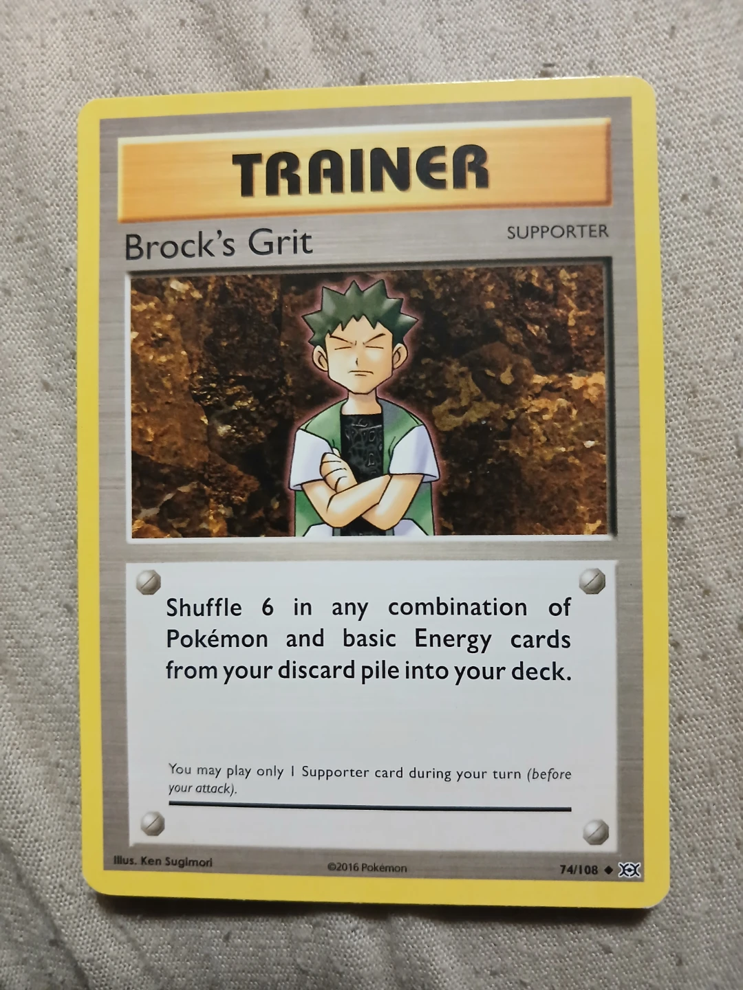 Brock's Grit Trainer 74/108 2016 Pokémon Card