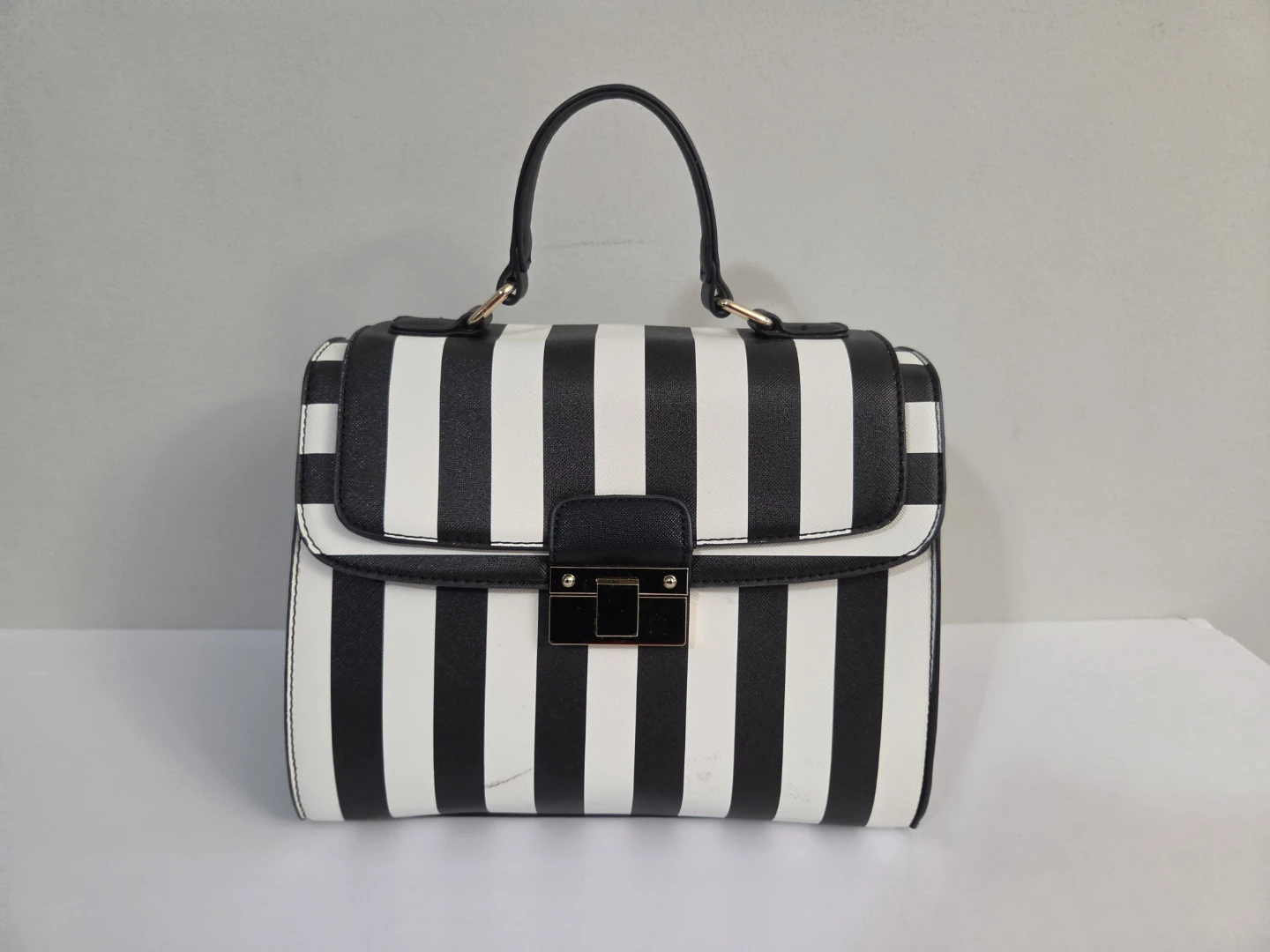 Black and white striped handbag