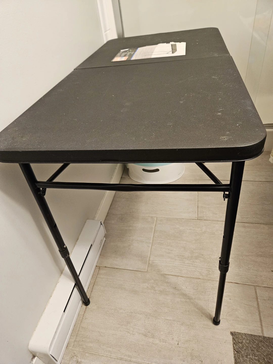 Black foldable utility table